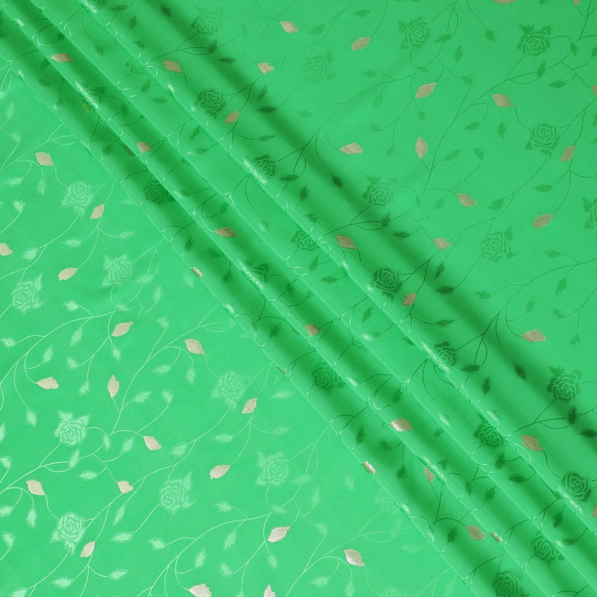Kelly green Premium pure silk crepe fabric with same tone jacquard and gold metallic lurex in dot design-D14633