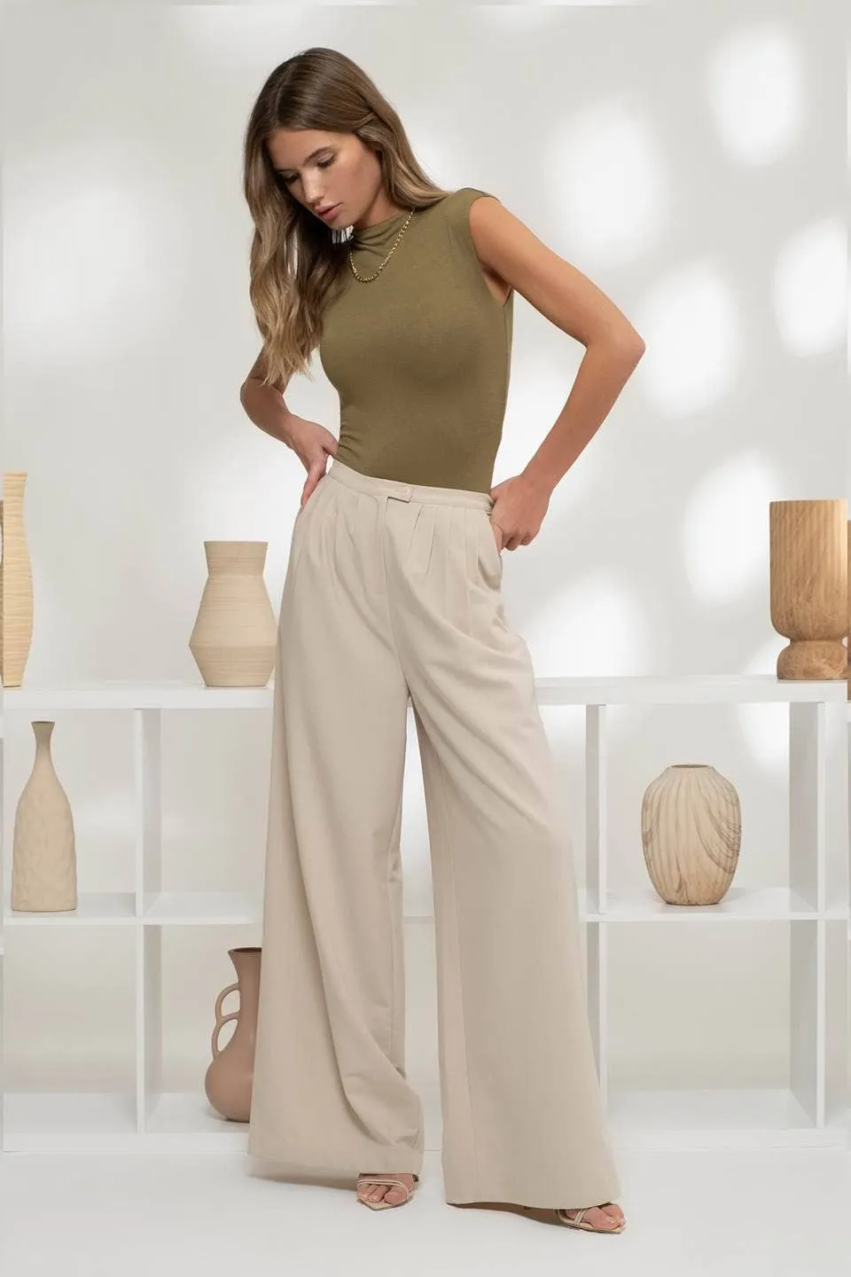 REVERSIBLE MOCK NECK SLEEVELESS KNIT BODYSUIT